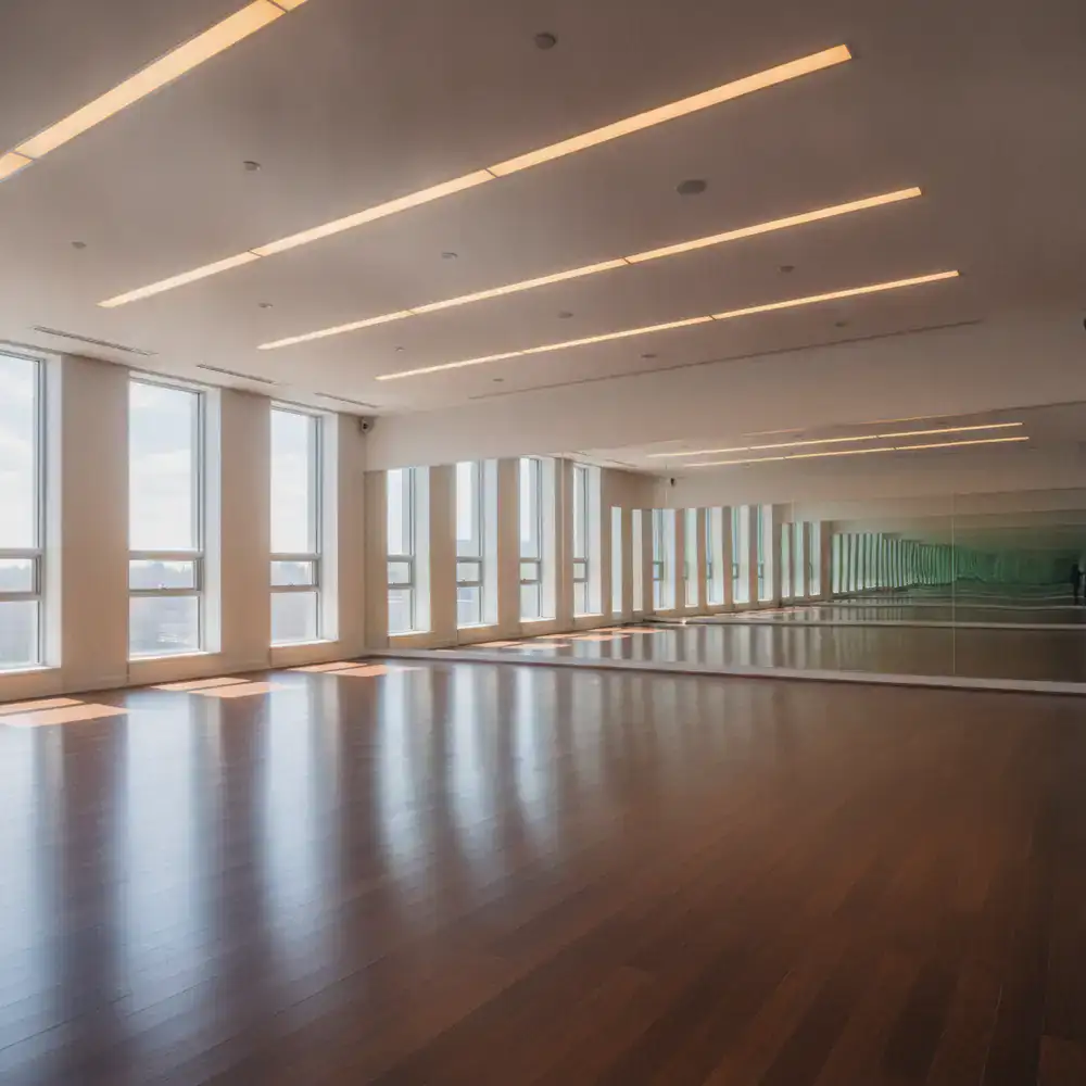 Empty fitness studio with polished mirrors